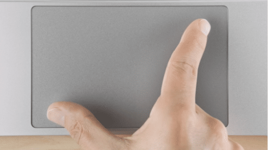 un geste pour zoomer sur un trackpad