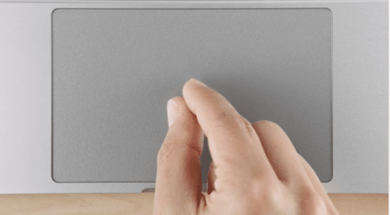 un geste pour faire un zoom arrière sur un trackpad