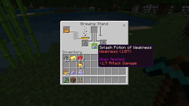 A Splash Potion of Weakness in the Brewing Stand in Minecraft