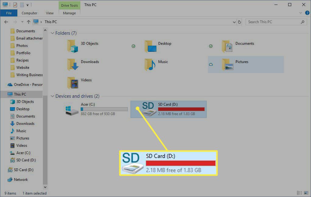 The SD card is highlighted in Windows Explorer.