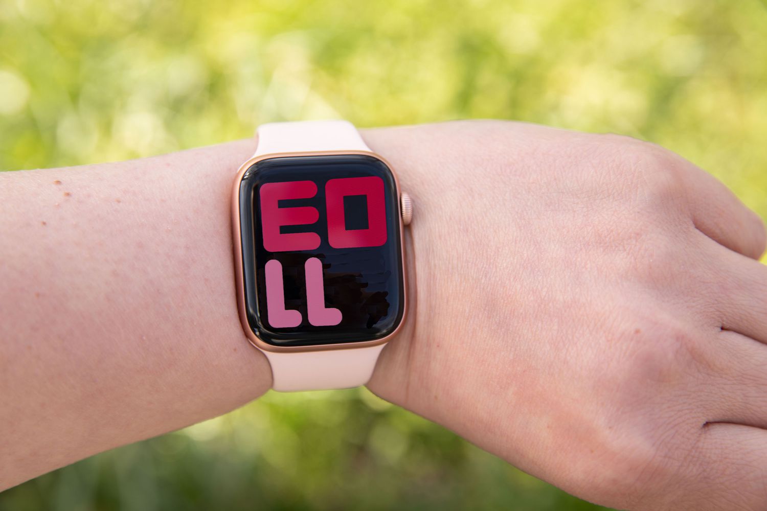 An Apple Watch with an upside-down display