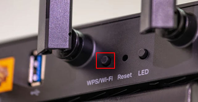 Hold the WPS button on router